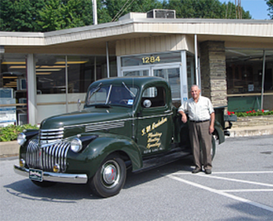I Wayne Brubaker in front of Showroom
