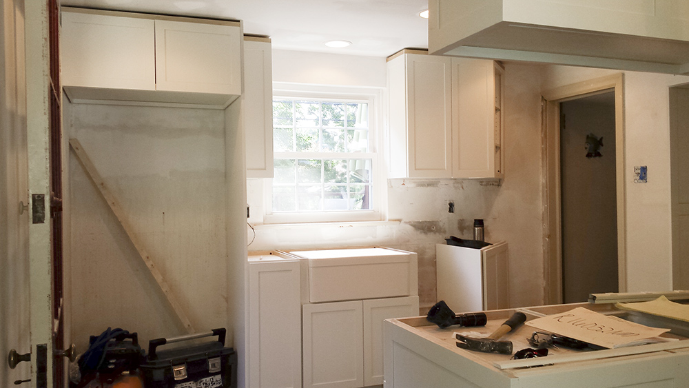 A kitchen in the process of being remodeled.