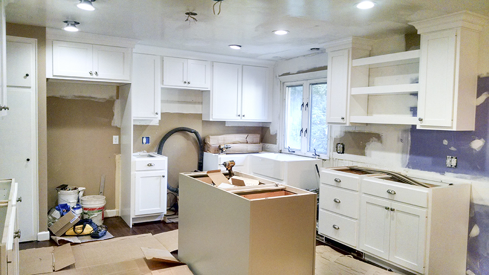 A kitchen in the process of being remodeled.
