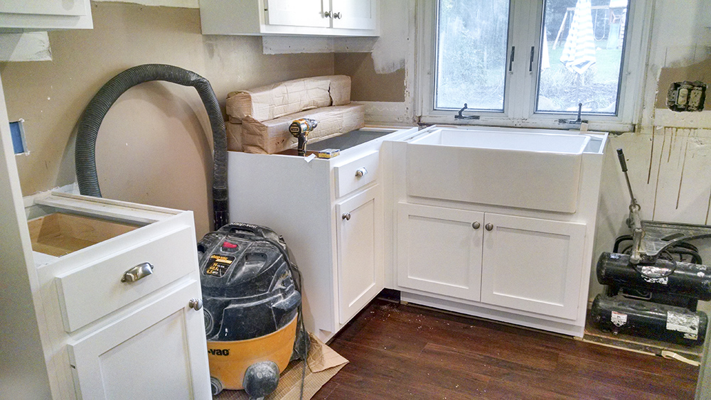 A kitchen in the process of being remodeled.