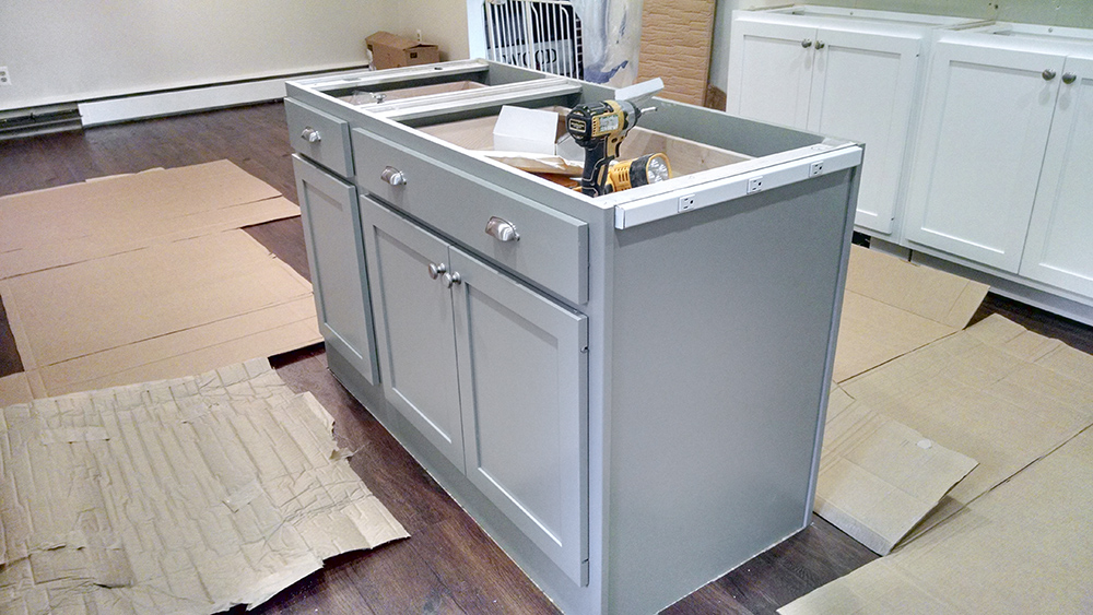 A kitchen in the process of being remodeled.