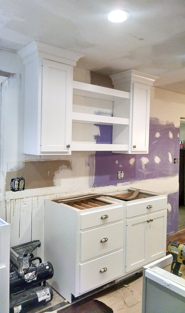 A kitchen in the process of being remodeled.