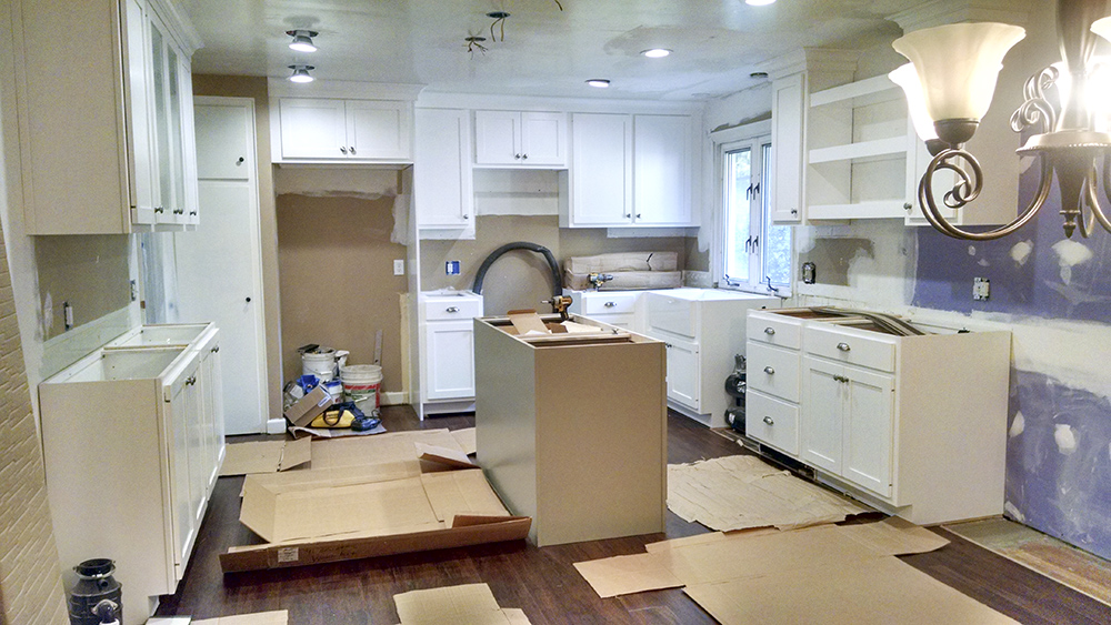 A kitchen in the process of being remodeled.