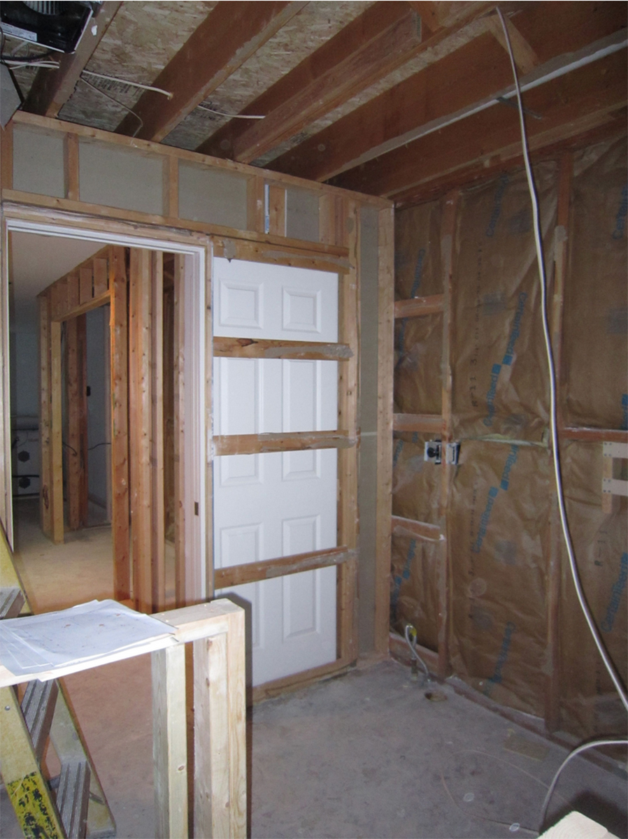 A room stripped all the way to the framing.