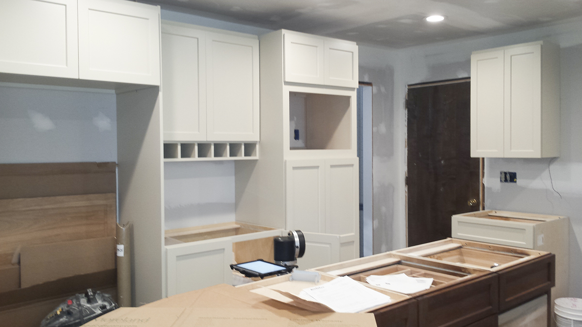 A kitchen in the process of being remodeled.