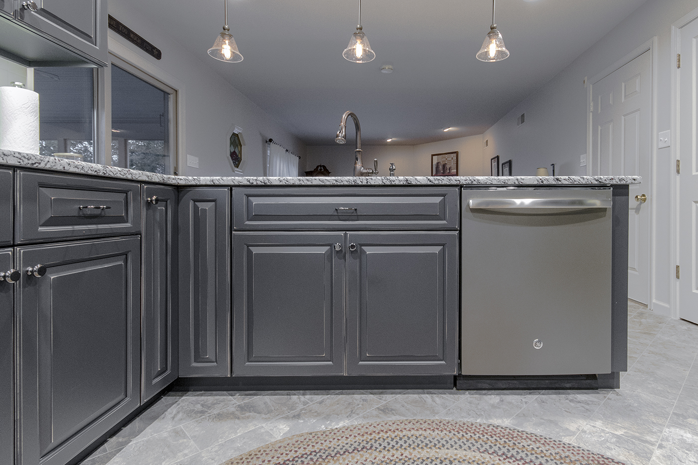 Kitchen cabinets and a dishwasher.